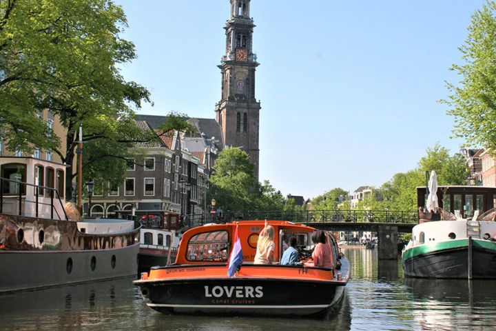 Crociera sui canali di Amsterdam dalla stazione centrale image