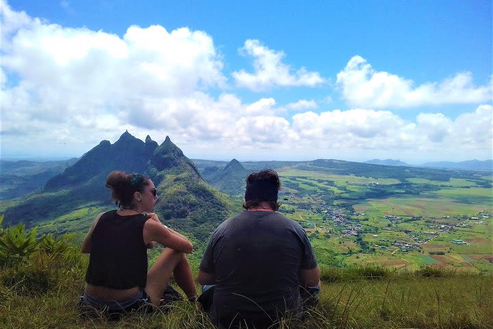 Climb Le Pouce Mountain image