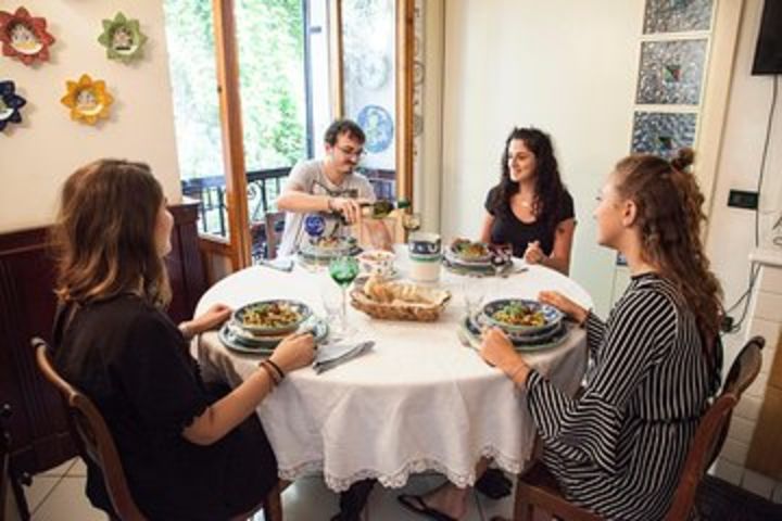 Dining experience at a local's home in Cagliari with show cooking image