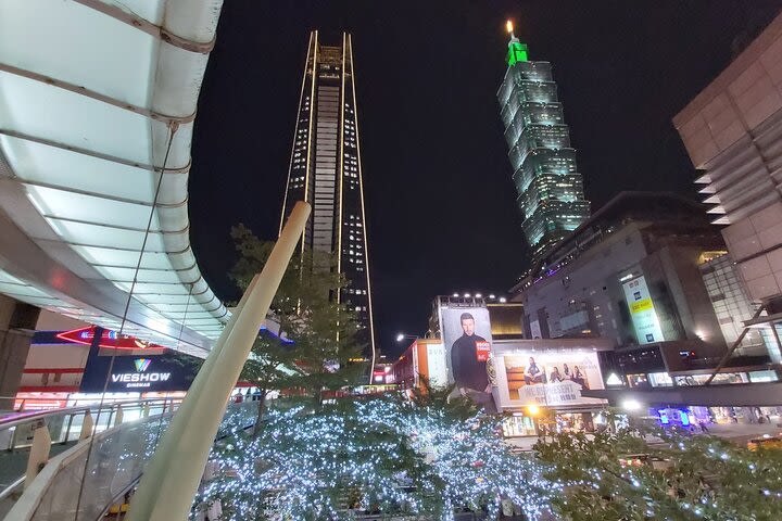 Taipei at Night: Din Tai Fung Dinner & Raohe Street Night Market Guided Tour image