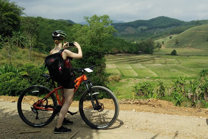 Full day Mountain biking to Waterfall and Hot spring image