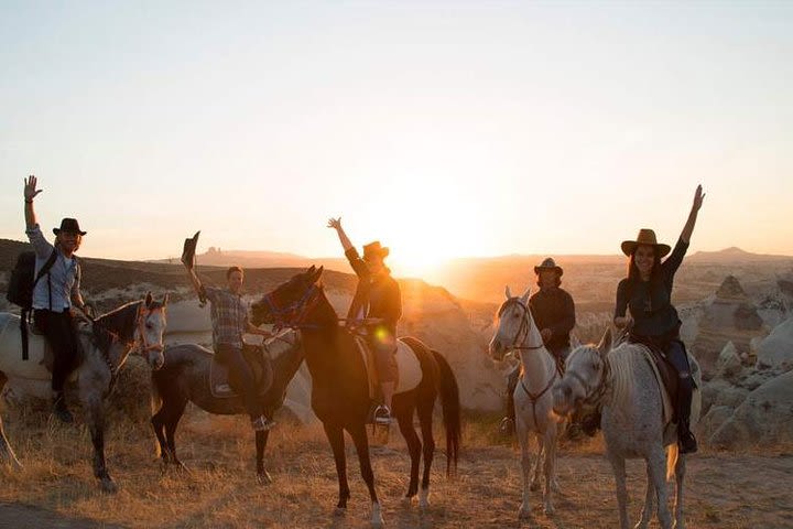 Sunset Horseback Riding Through The Valleys In Cappadocia image