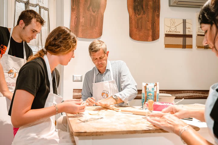 Private cooking class at a local's home with lunch or dinner in Turin image