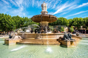 Monumental Fontaine de la Rotonde fountain with three graces sculptures and lion statues on Cours Mirabeau in Aix-en-Provence France