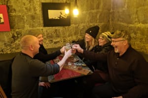 A group of friends enjoying drinks on The Reykjavik Beer & Booze Tour