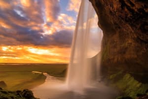 Seljalandsfoss waterfall in Iceland with walking path behind the falls