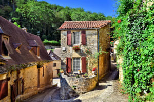 Medieval stone houses and narrow streets in Dordogne village