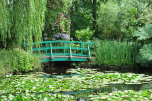 Japanese bridge over the water lily pond in Monet’s garden