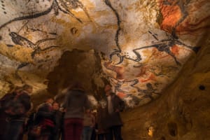 Large prehistoric animal paintings in the Hall of the Bulls at Lascaux