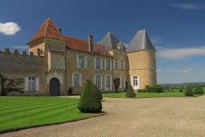 Elegant Château d’Yquem building surrounded by vineyards in Sauternes