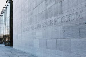 Stone exterior wall with the National Air and Space Museum name in Washington, DC