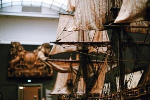 Detailed model sailing ship displayed inside the Rijksmuseum