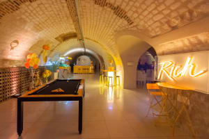 Contemporary reception space inside Veuve Clicquot’s historic Champagne cellars in Reims.