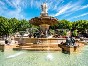 Monumental Fontaine de la Rotonde fountain with three graces sculptures and lion statues on Cours Mirabeau in Aix-en-Provence France