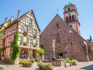 Medieval bridge and half-timbered houses in Kaysersberg village