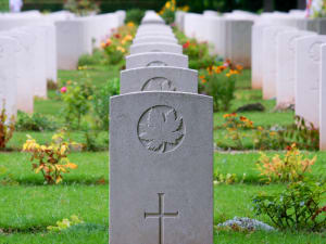 Rows of white headstones at Bény-sur-Mer Canadian War Cemetery