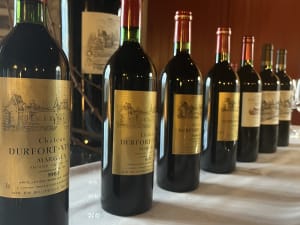 Seven bottles of Château Durfort-Vivens spanning multiple decades for private vertical wine tasting in Margaux