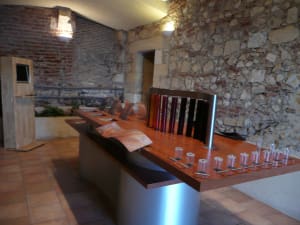 Wine tasting table inside a traditional cellar in the Bergerac wine region