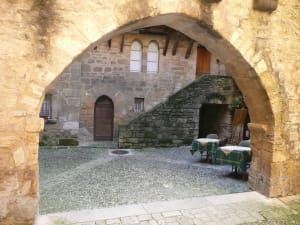 Golden limestone medieval architecture lining the cobbled streets of Sarlat-la-Canéda in the Dordogne, Périgord Noir