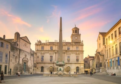 Town hall and obelisk in the central square of Arles at sunset