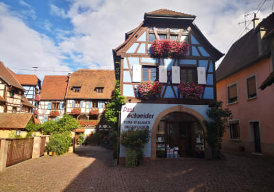 Exterior of a family-run winery visited during a half-day wine tour from Colmar