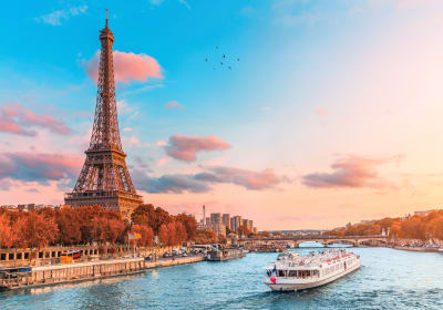Eiffel Tower illuminated at sunset