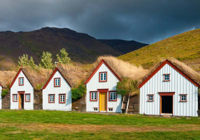 Historic Laufás turf houses with grass roofs and wooden facades