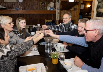 A group saying skál or cheers after a great private Reykjavik Food Tour