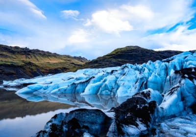 Close-up view of Sólheimajökull glacier with blue ice and rugged surface