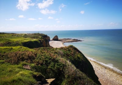 German bunker and bomb craters at Pointe du Hoc, Normandy