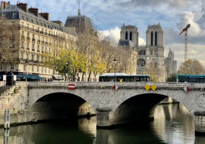 Bridge over the Seine with Notre-Dame in the background.