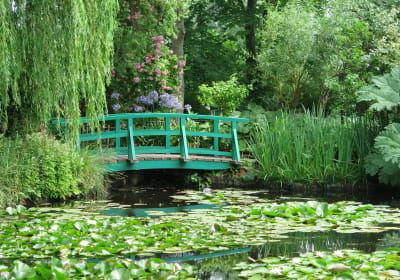Japanese bridge over the water lily pond in Monet’s garden