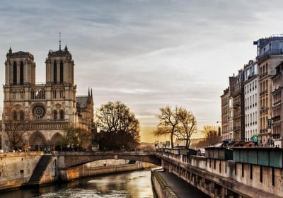 Notre-Dame Cathedral beside the Seine in central Paris at sunset
