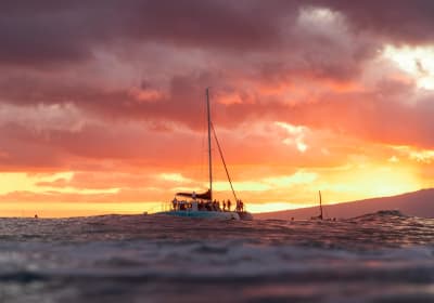 Board from Waikiki Beach for a scenic Sunset Sail on the Hāwea 2