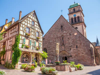 Medieval bridge and half-timbered houses in Kaysersberg village