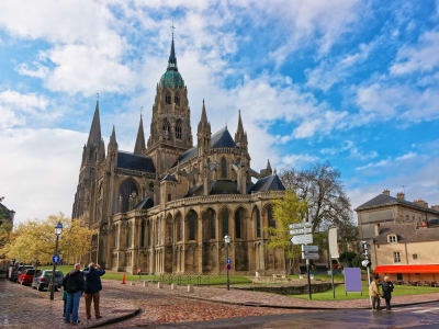 Cobblestone street in Bayeux with half-timbered houses beside the cathedral
