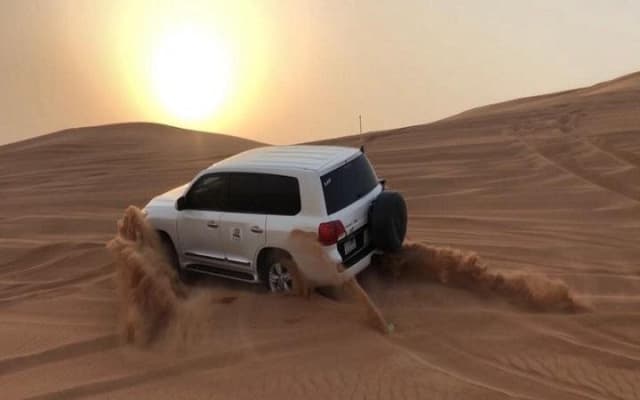 Premium Sundowner Red Dunes & Camel Safari with BBQ Dinner