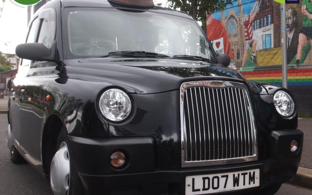 Black Taxi Mural "Tour Like A Local"