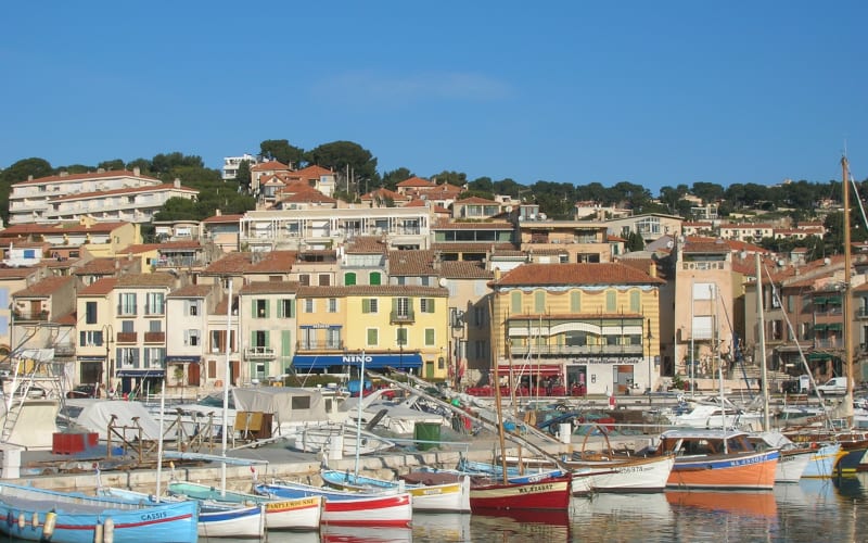 Colorful harbor of Cassis village visited during a Provence day trip from Aix-en-Provence