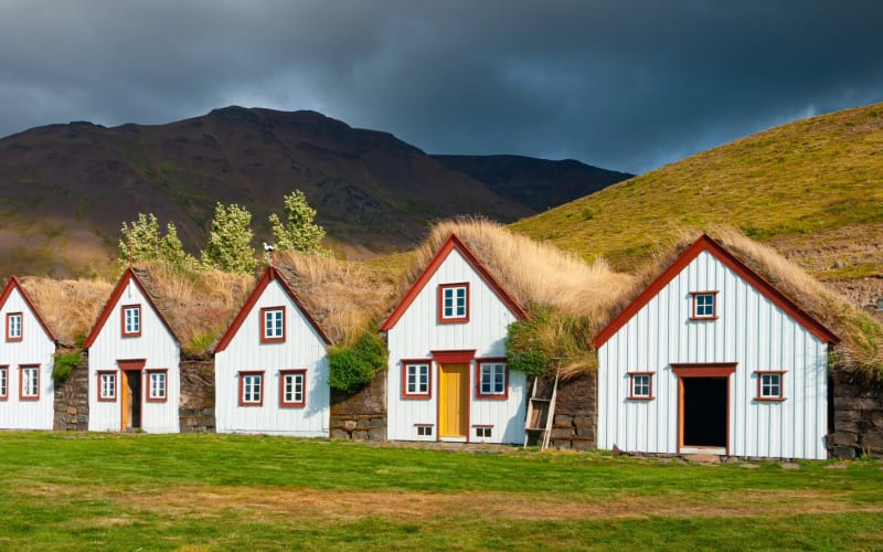Historic Laufás turf houses with grass roofs and wooden facades