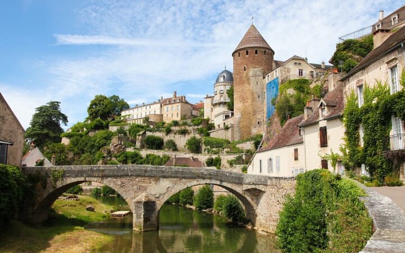 Historic fortified town of Semur-en-Auxois with river views visited on a Burgundy day trip from Dijon