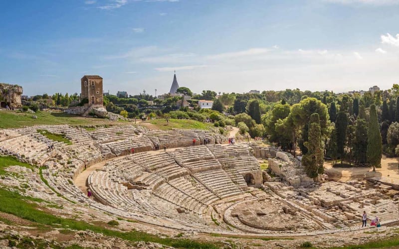 The ancient Greek Theatre of Syracuse in the Neapolis Archaeological Park on a sunny day
