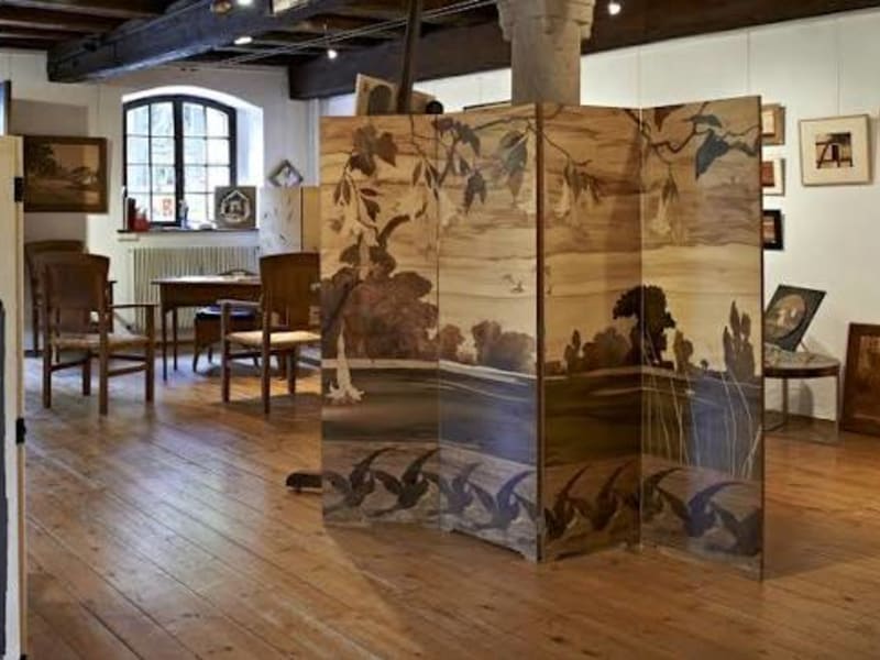 Wooden folding screen with landscape marquetry in Spindler workshop in Alsace