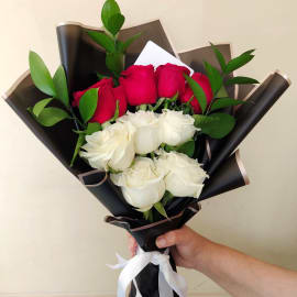 Red and White Roses bouquet in black wrapping  