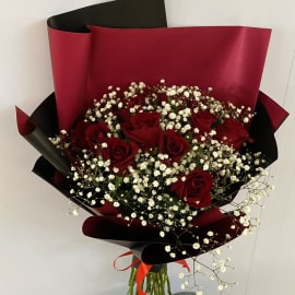 Red Roses and Baby's Breath Filling in Black and Red Wrapping 