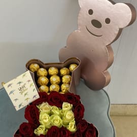 Red and White Roses with Ferrero Rocher chocolates in Bear shape Box.