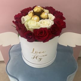 Red And White Roses with Ferrero Rocher Topping in a White Love can Fly box. 
