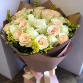 Bouquet of Pink and White roses with solidago in an elegant brown wrapping. 