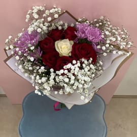 Bouquet of Red Roses with white rose and baby's breath filling  and alstroemeria .