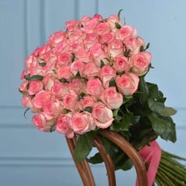 : Close-up of 50 double color pink roses, showcasing their radiant beauty and delicate petals, evoking emotions and enchantment.